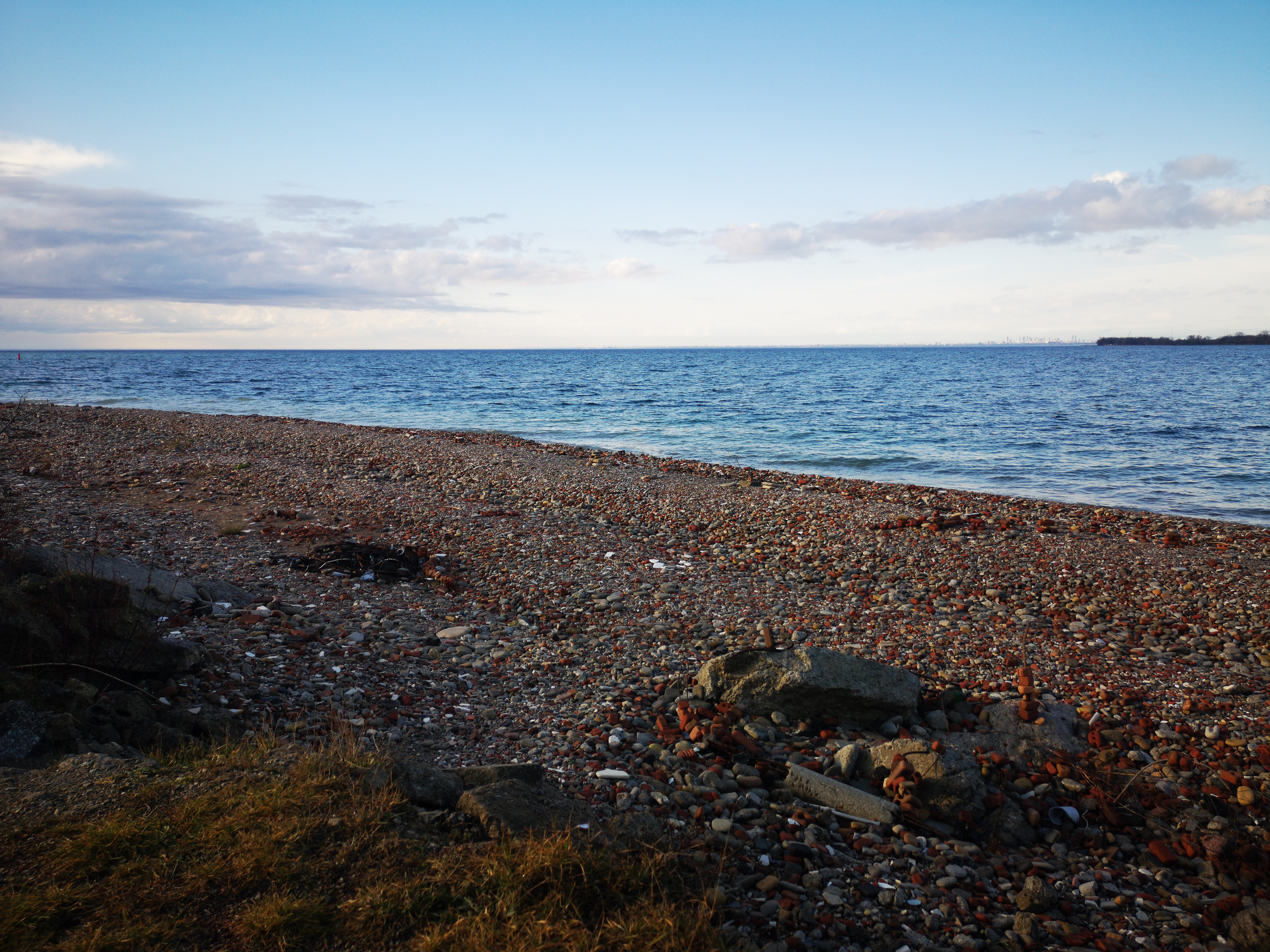 Coastal calm — pastel gradients at the shore.